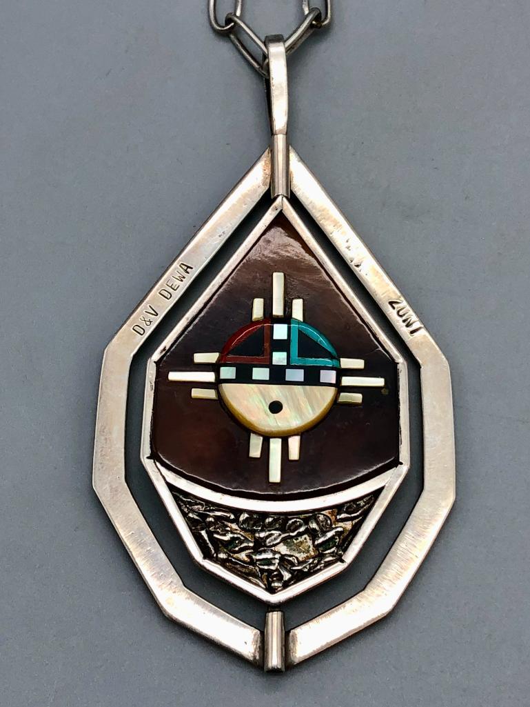 Don & Velma Dewa Spinner Necklace - Zuni/Inlay: Offered here for your consideration is a Don and Velma Dewa spinner necklace with Zuni inlay. This necklace features absolutely marvelous inlay with different pictorial designs on each side; one side 
