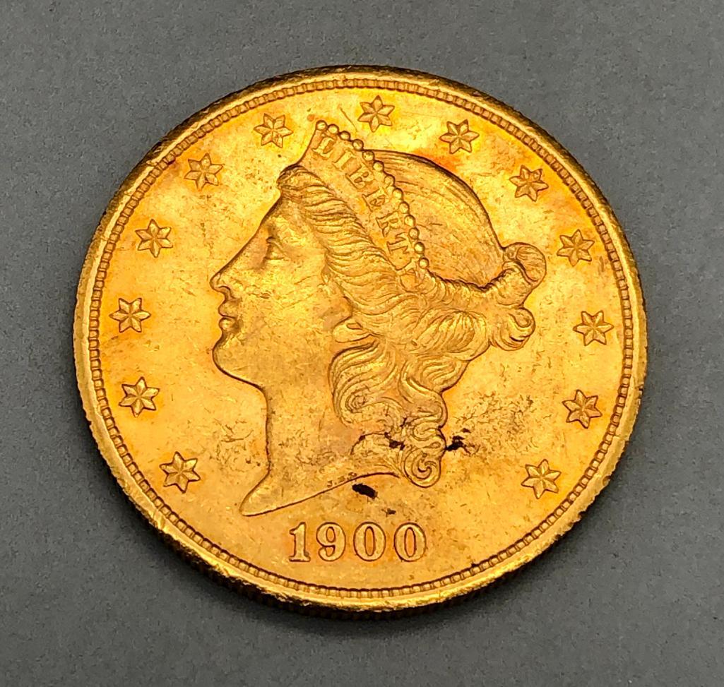 1900 Gold $20 Liberty Coin: Offered here for your consideration is a 1900 $20 Liberty Gold coin. This is a great historic piece would be a fantastic addition to your collection. First minted in 1849, the gold content of the Libe