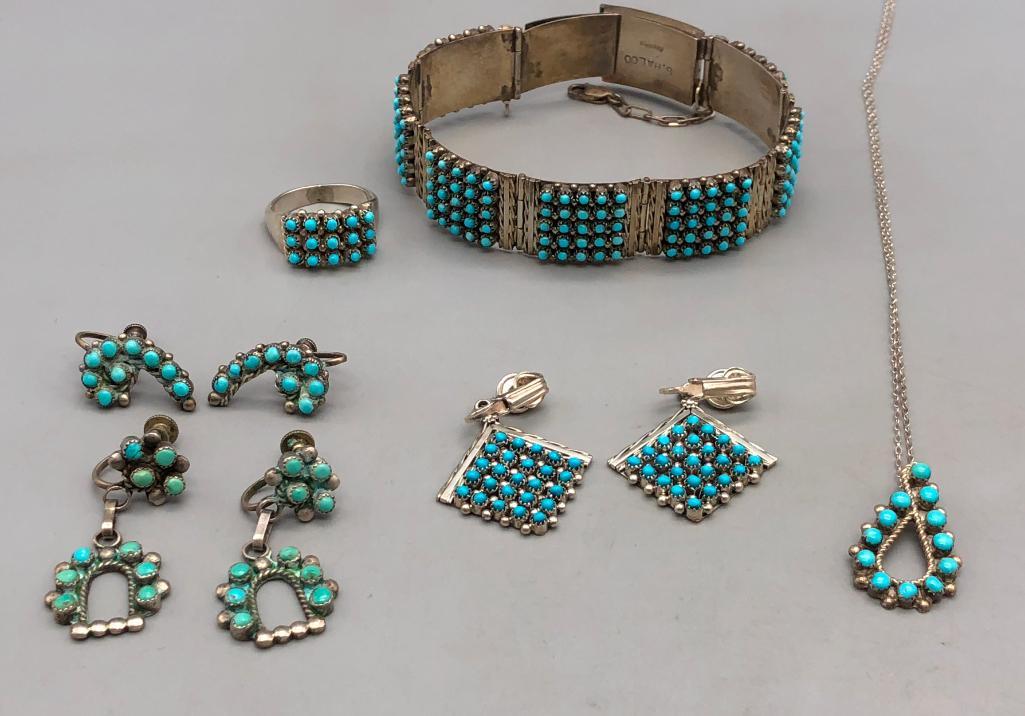 Group of Zuni Snake-Eye/Dot Turquoise Jewelry: Featured here is a group of Zuni snake-eye/dot turquoise jewelry. This wonderful group features an array of snake eye turquoise across a dainty pendant, two screw-back dangle earrings, a seven panel s