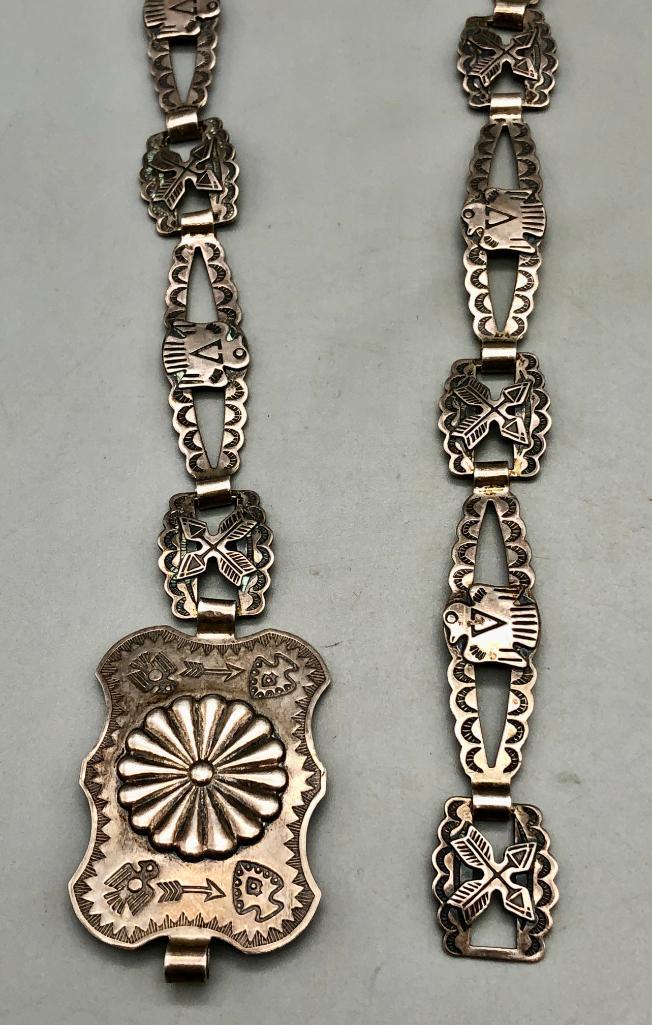 Fred Harvey Era Thunderbird and Cross Arrow Concho Belt: For your bidding pleasure is a Fred Harvey era thunderbird and cross arrow concho belt. This incredibly detailed concho belt has multiple concho pieces, with crossed arrow and thunderbird silver work,