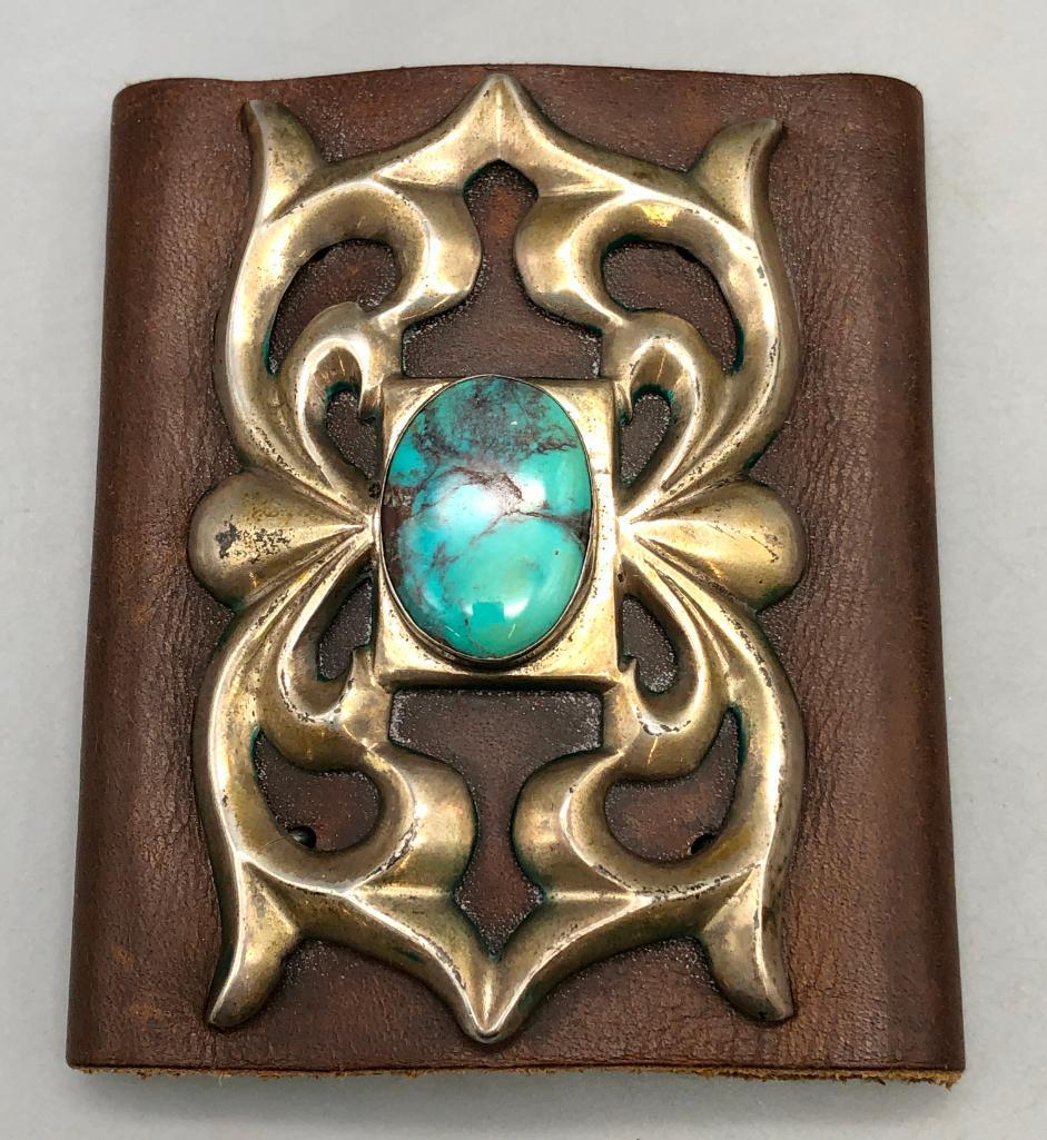 Vintage Sterling Silver and Turquoise Ketoh: For your bidding today is this vintage sterling silver and turquoise ketoh. This incredible piece has a sandcast design with a gorgeous colored turquoise cabochon set in a smooth bezel on a rectangula