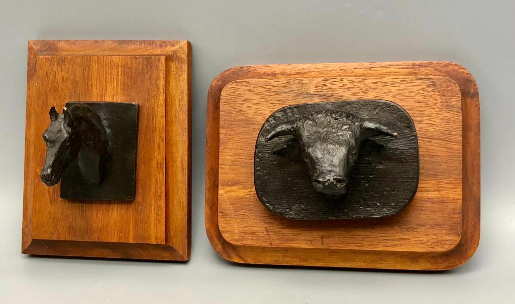 Two C.M. Russell Bronze Recast Wall Hangings: Available here for your consideration are two C.M. Russell bronze recast wall hangings. Charles Marion Russell, also known as C. M. Russell, Charlie Russell, and "Kid" Russell, was an American artist 
