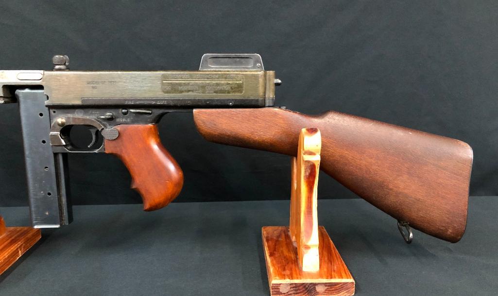 Thompson Sub Machine Gun Non Firing Replica: Up for your consideration in this auction is a replica Thompson Submachine Gun manufactured by the Model Gun Company in Japan. If has alloy metal construction and a wood stock and fore grip. This is g