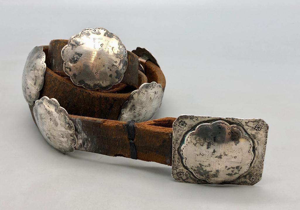 Vintage Rocker Engraved Sterling Silver Concho Belt: Offered here for your consideration is a vintage "Rocker Engraved" sterling silver concho belt. The belt has nine scalloped conchos and a larger buckle, each with cross themed rocker engraved designs.