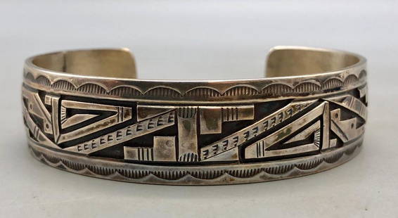 Sterling Silver Overlay Bracelet By Peter Nelson: For your bidding pleasure is a sterling silver overlay bracelet by Peter Nelson. This gorgeous bracelet features a geometric design overlay with near perfect cut outs and lines. A darkened background