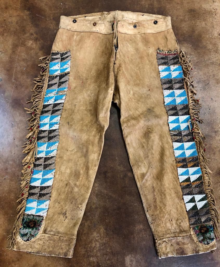 Brain Tanned Handmade Beaded Leather Leggings: Offered here for your consideration are brain tanned handmade beaded leather leggings. These leggings are made of supple leather with fringe on the sides. They have beautiful, colorful beadwork on eac