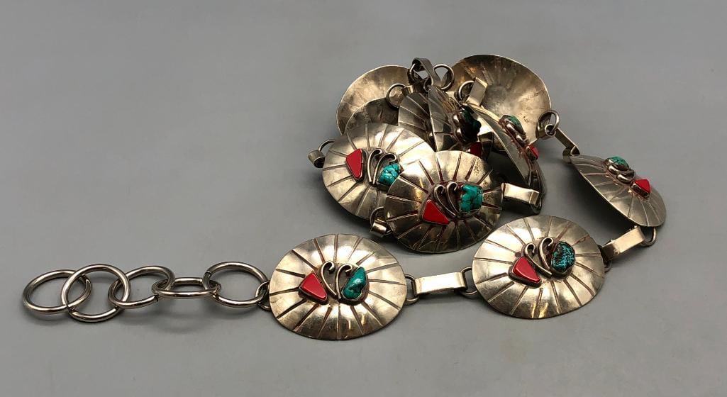 Vintage Turquoise And Coral Link Concho Belt: Offered here for your consideration is a vintage turquoise and coral link concho belt. The belt has 11 conchos and a buckle in an oval shape each with a turquoise and a coral cabochon set in smooth be