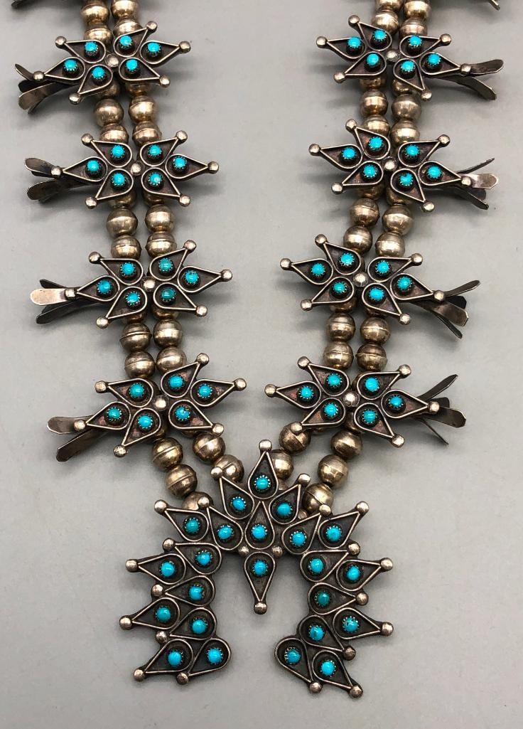 Vintage Snake Eye/Dot Turquoise Squash Blossom Necklace With Four Petals: Offered here for your consideration is a vintage snake eye/dot turquoise squash blossom necklace with four petals. This necklace features a lovely crescent shaped naja highlighted with 23 dot turquois