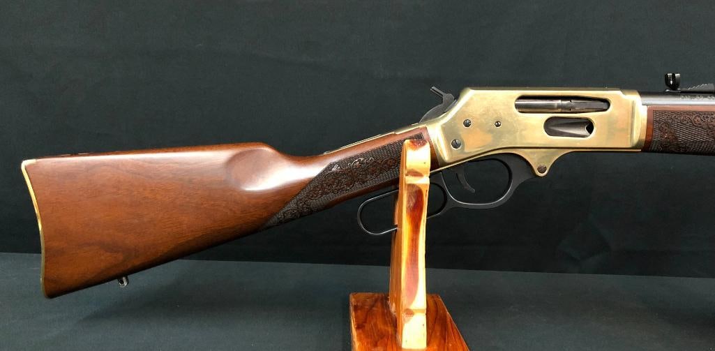 Henry Model HO24-3855 Lever Action Rifle: For your bidding pleasure is a Henry Model 24-3855 lever action rifle. This rifle has a brass plated frame, butt plate, and barrel band. Additionally, it has beautiful checkered wood stock and forearm