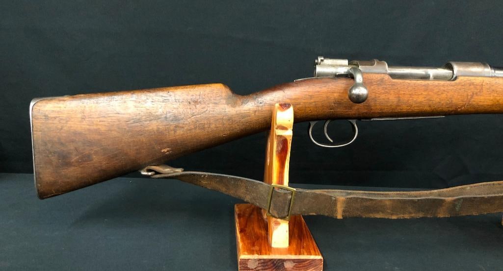 1895 Chilean Mauser 7x57: Offered here for your consideration is a Chileno Modelo 1895 Mauser chambered in 7x57 Mauser. It is equipped with a leather sling, metal butt plate, nad iron sights. It has a wood stock. ***This firea