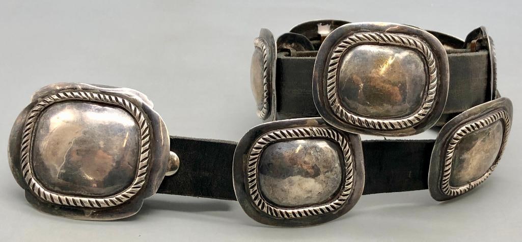 Sterling Silver Concho Belt By Alberto Contreras: Offered here for your consideration is a sterling silver concho belt by Alberto Contreras. The belt has nine conchos and one buckle each with deep line designs on smooth silver. The conchos and buckle