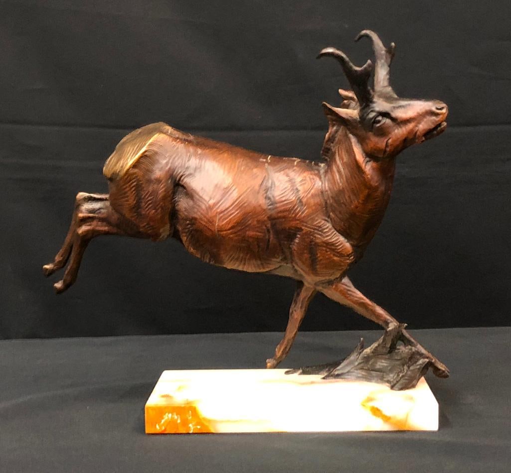 Antelope Bronze By Don Ostermiller: Offered here for your consideration is Antelope, a bronze by Don Ostermiller. This sculpture by one of America's premier wildlife artists depicts a running pronghorn antelope. The artist did not j