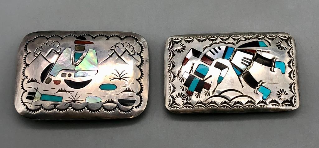 Two Figural Inlay Belt Buckles: Offered here for your consideration are two figural inlay belt buckles. These sterling silver belt buckles feature flush and mosaic inlays created with turquoise, coral, onyx, and mother of pearl. The