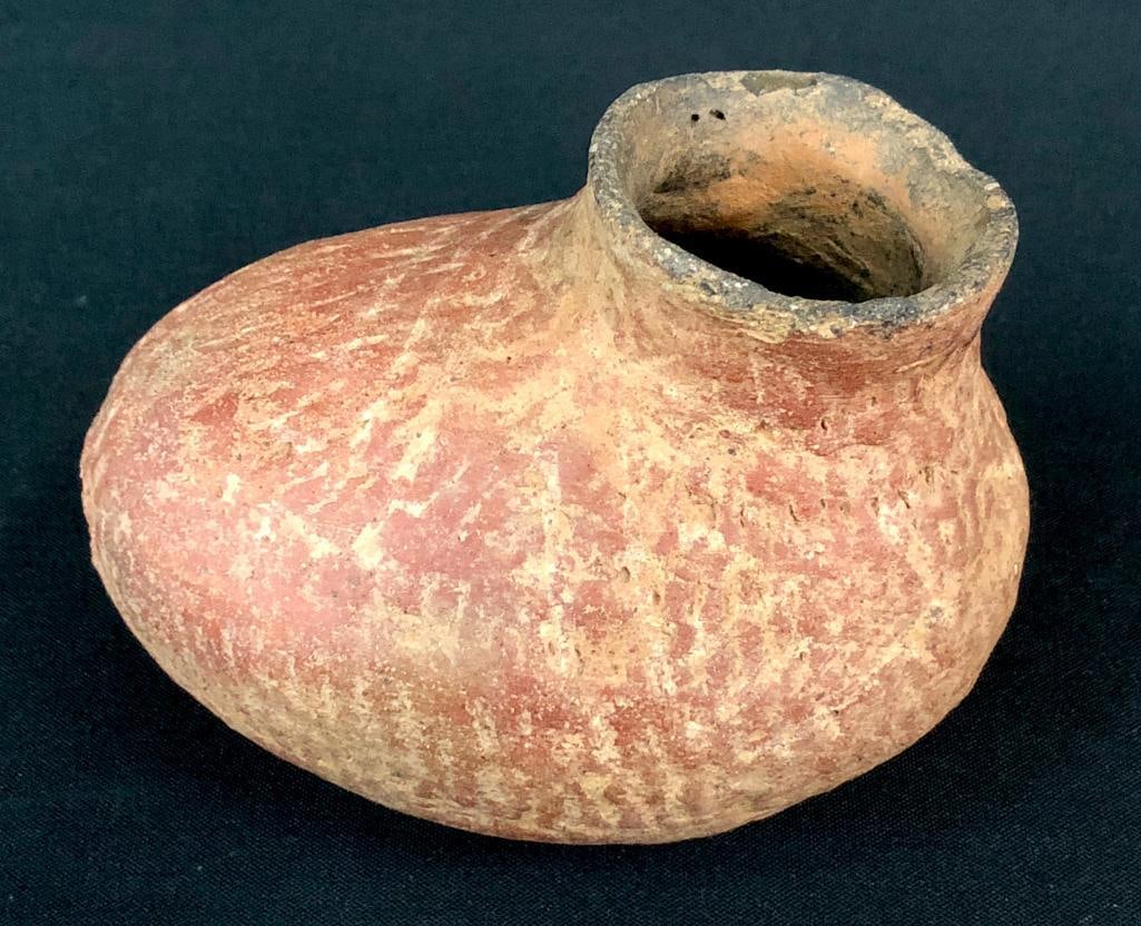 Uniquely Shaped Prehistoric Pottery Vessel: Offered here for your consideration is a uniquely shaped prehistoric pottery vessel. This prehistoric vessel is made of red clay and appears to have been decorated with impressions from cord and white