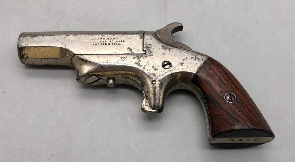 Brown Mfg. Co. Southern Derringer: Offered here for your consideration is a Brown Mfg. Company Southern Model single shot Derringer. It is nickel plated with wood grips. It is chambered in .41 rimfire and has a 2 1/2 inch barrel with a