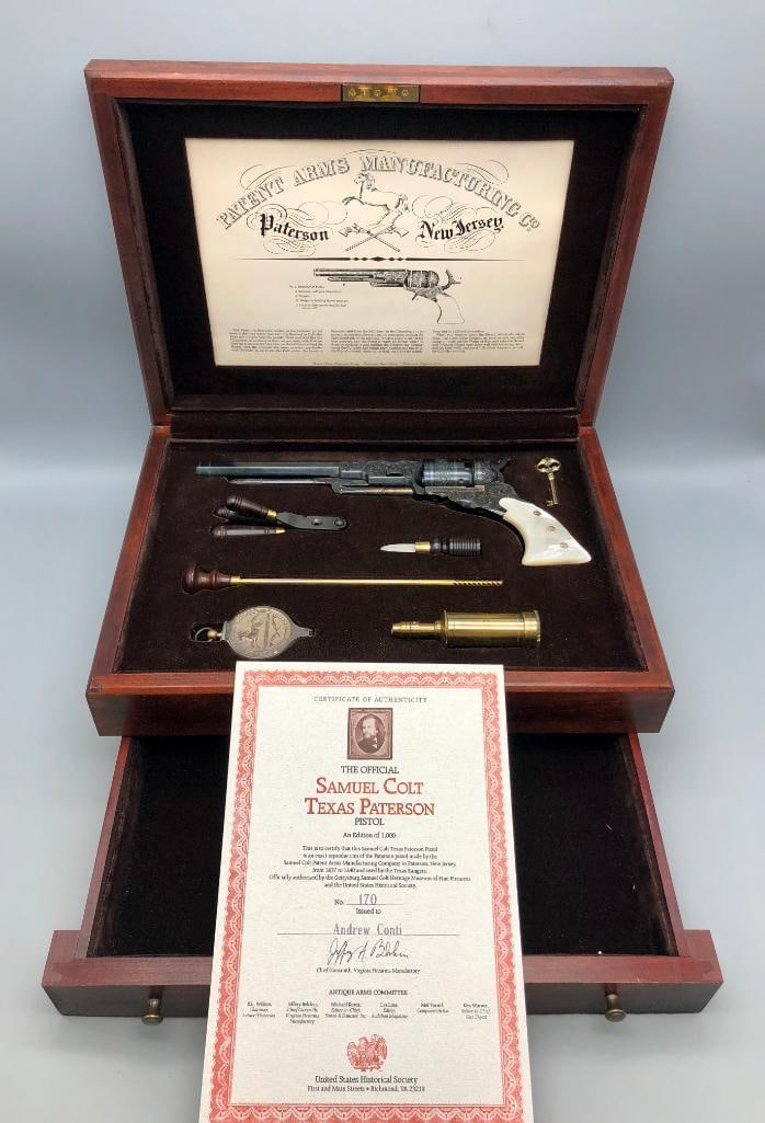 U.S. Historical Society Colt Texas Paterson Revolver.: Offered here for your consideration is an official cased reproduction Samuel Colt Texas Paterson revolver. This revolver is configured as an engraved #5 Paterson with mother of pearl grips, a wood cas