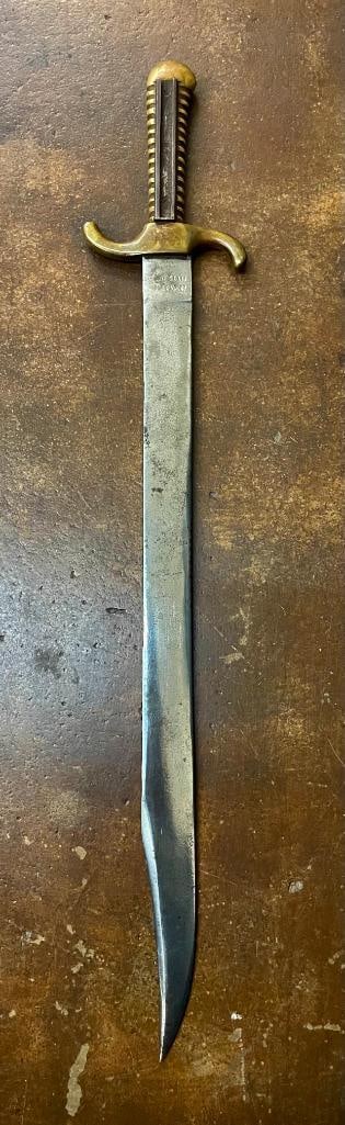 Brown And Tetley Saber Bayonet: Offered here for your consideration is a Brown and Tetley saber bayonet. It measures 20 inches overall with a 16 inch blade. It has a brass handle with integral bolster. There is a rail mounted on the