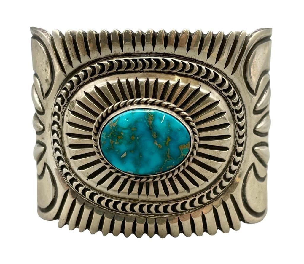 High Grade Turquoise And Sterling Silver Bracelet By Arnold Blackgoat: For your bidding enjoyment we present a high grade turquoise and sterling silver bracelet by Arnold Blackgoat. This bracelet is highlighted with a high grade turquoise cabochon resting in a smooth sil