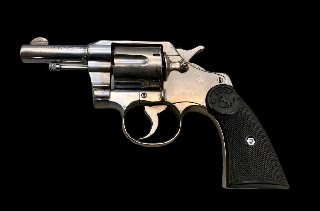 Colt New Army 38 Special (1922): For your bidding pleasure is a Colt New Army 38 Special. This pistol is in good condition for its age. The finish of this firearm is a shiny nickle plated. The grips on the firearm are in good shape w