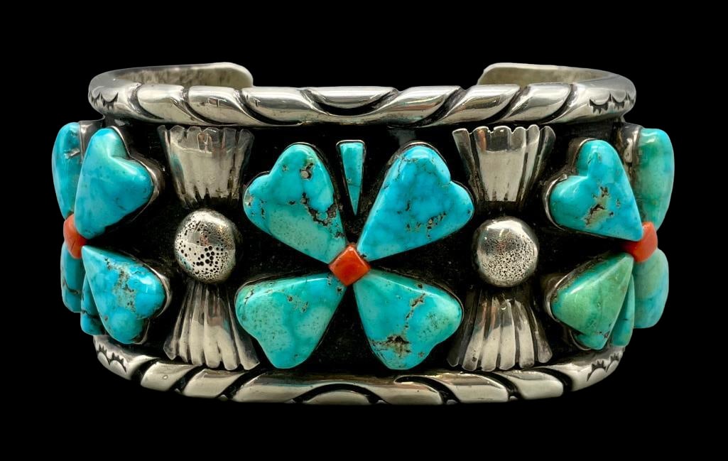 Hefty Carved Turquoise And Coral Bracelet: For your bidding enjoyment we present a hefty carved turquoise and coral bracelet. This bracelet features three five stone turquoise cabochons carved into a heart shape, resting in smooth silver bezel