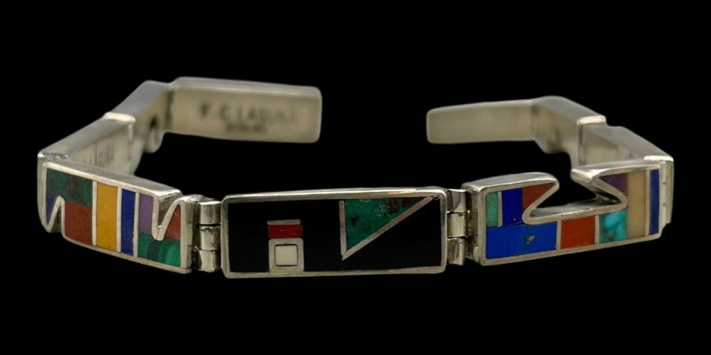 Multi Stone Inlay Link Bracelet By Frank Carillo: Presented for your consideration is a multi stone inlay link bracelet by Frank Carillo. This stunning link bracelet showcases a captivating multi stone inlay design consisting of turquoise, coral, lap