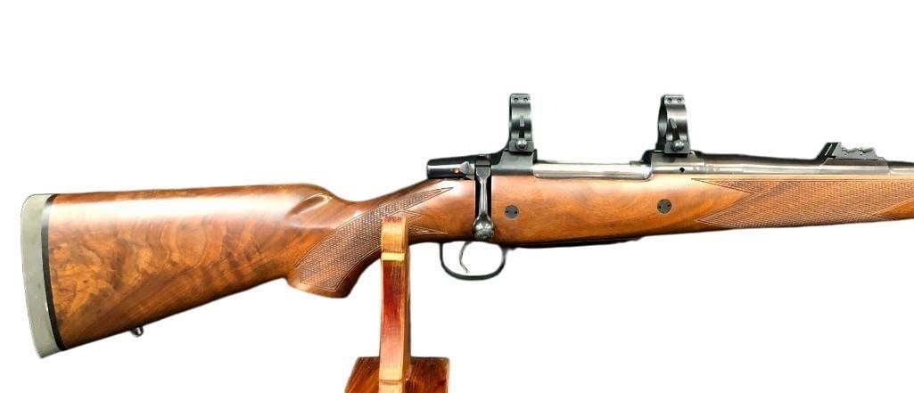 CZ 550 Safari Classic In 416 Rigby: For your bidding pleasure is a CZ 550 Safari Classic chambered for 416 Rigby. The stock is heavy and made from nice wood with a checkered design and a rubber recoil pad. There are graduated leaf sight