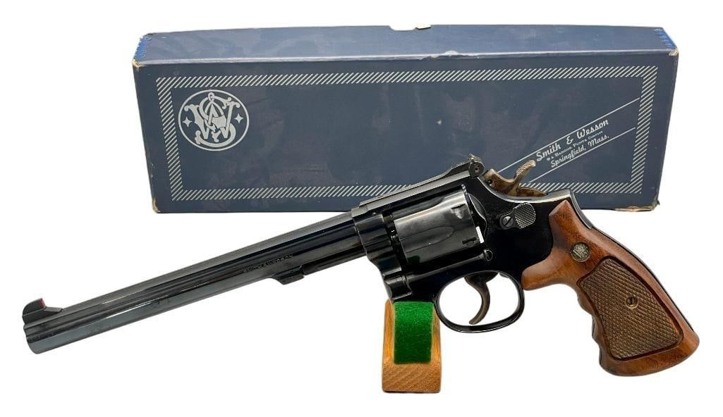 Smith & Wesson Model 14-4 .38 Special: For your bidding pleasure is a Smith & Wesson model 14-4 .38 special. This good looking revolver has a blued barrel, cylinder and frame with a color case hardened hammer and trigger. The adjustabl