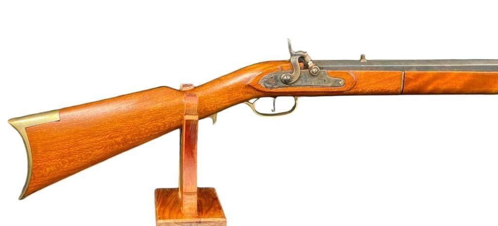 Connecticut Valley Arms Black Powder .45 Cal Rifle: For your bidding pleasure is a Connecticut Valley Arms black powder .45 caliber rifle. This is a reproduction Kentucky style black powder percussion rifle. It has a brass trigger guard, butt plate, ba