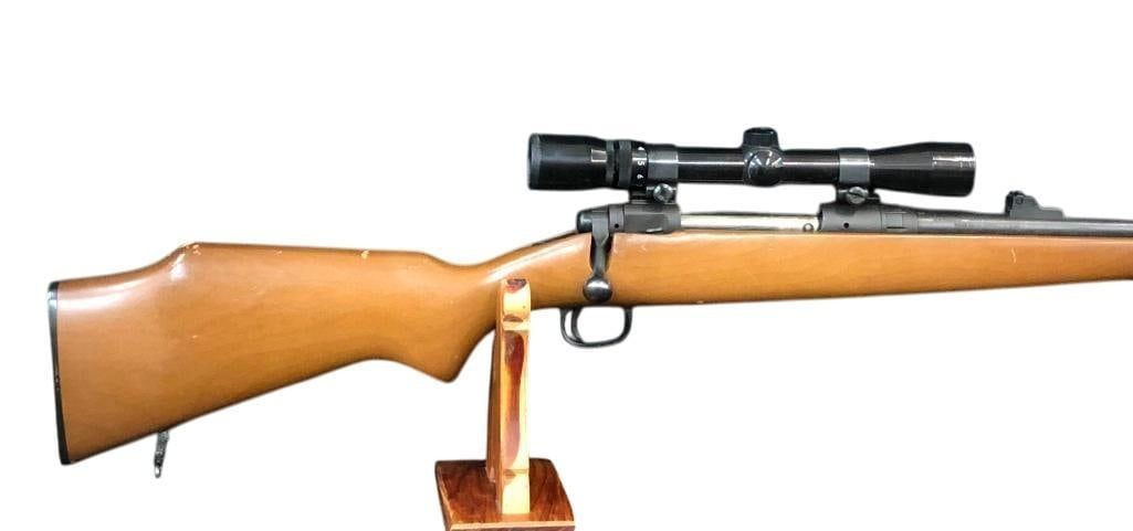 Savage MI-10E 270 WIN Rifle With Scope: For your bidding pleasure is a Savage MI-10E 270 WIN rifle with scope. With a nice plain wood stock this bolt action with internal magazine comes with a Bushnell Sport View 3x9 scope and Weaver mounts