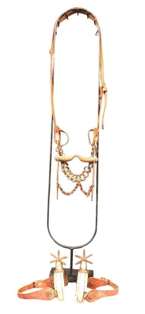 Vintage Mexican Bit And Spurs: Offered here for your consideration is a group consisting of a vintage Mexican bit with leather headstall and a pair of Mexican spurs. The spurs are double mounted with long six point rowels. The bit 