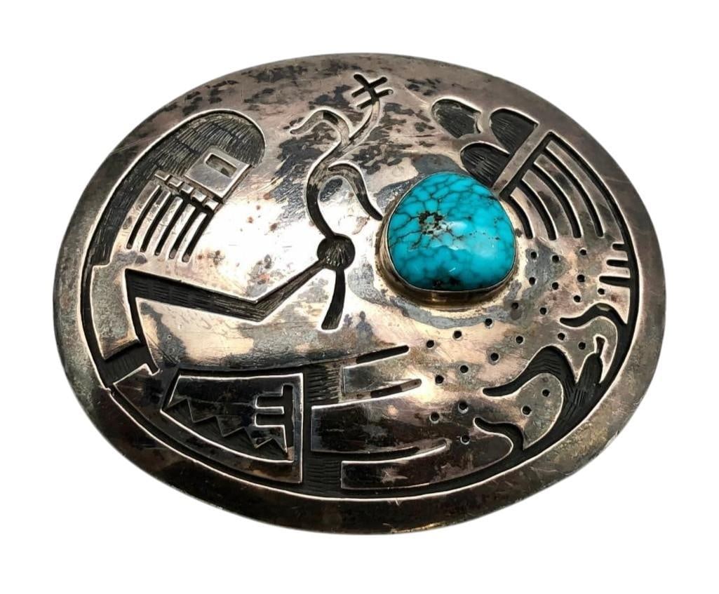 Manuel Hoyungwa Turquoise And Sterling Silver Overlay Belt Buckle: For your bidding pleasure is a Manuel Hoyungwa turquoise and sterling silver overlay belt buckle. This eye catching buckle showcases a turquoise cabochon displayed in a smooth silver bezel. Surroundin
