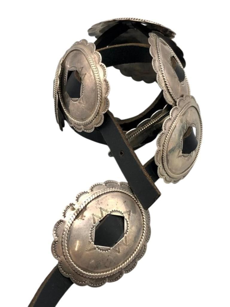 Vintage Sterling Silver Concho Belt With Leather (Unfinished): Offered here for your consideration is a vintage sterling silver concho belt with leather (unfinished). The belt features nine stunning sterling silver conchos each showcasing intricate hand stamped d