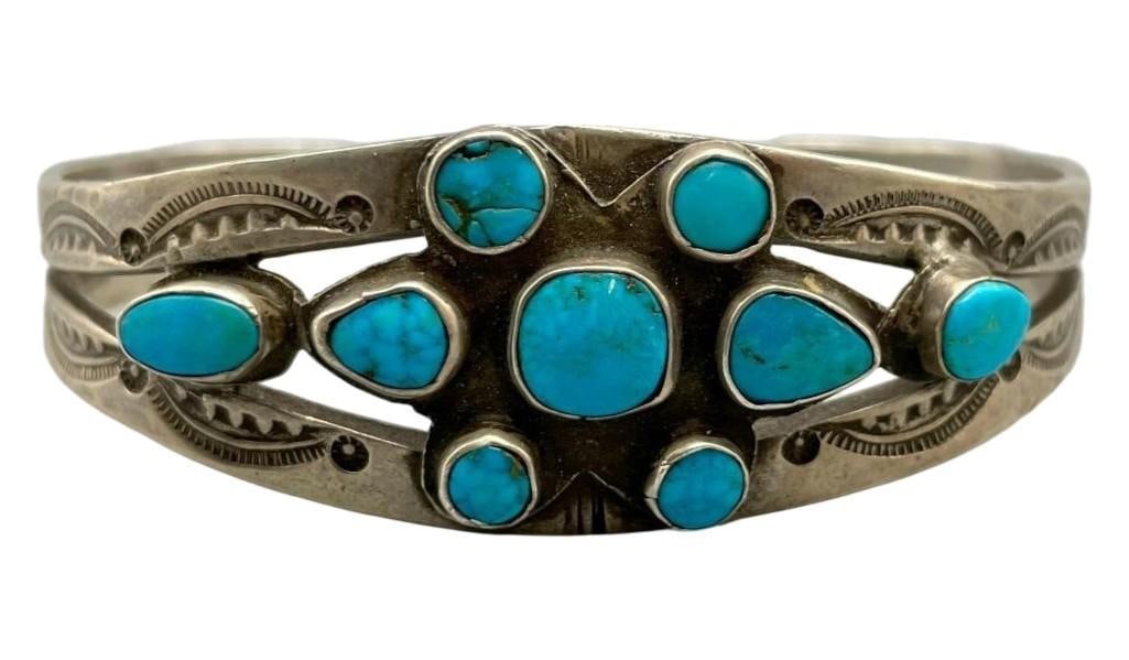 1940s Era Natural Turquoise Bracelet: For your bidding enjoyment we present a 1940s era natural turquoise bracelet. This bracelet is beautifully highlighted with nine natural turquoise cabochons in varying sizes displayed in smooth silver