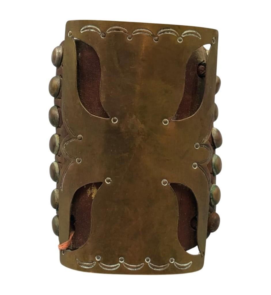 Vintage Brass - Tacked Bow Guard: Offered here for your consideration is a vintage brass - tacked bow guard. This charming bow guard features a large central brass setting beautifully accented with intricate cutouts and hand stamped d
