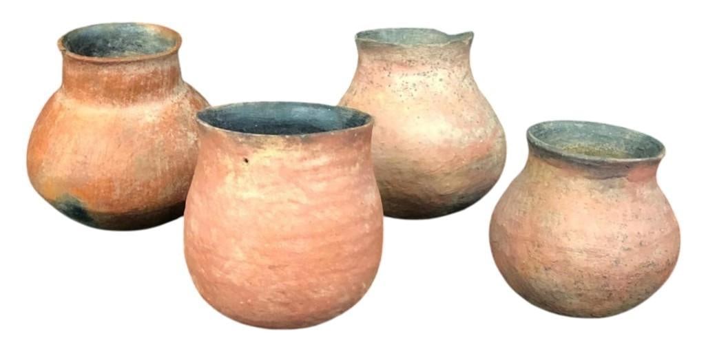 Group Of Four Prehistoric Anasazi Pots: Offered here for your consideration is a group of four prehistoric Anasazi pots. All four items are undecorated redware that first made its appearance in Anasazi sites in the late 600s A.D. These are