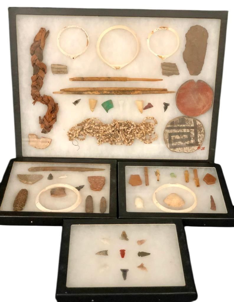 Display Of Prehistoric Artifacts: Offered here for your consideration is a display of prehistoric artifacts. One large and three small display cases contain a fascinating variety of artifacts from prehistoric times. Pottery shards and