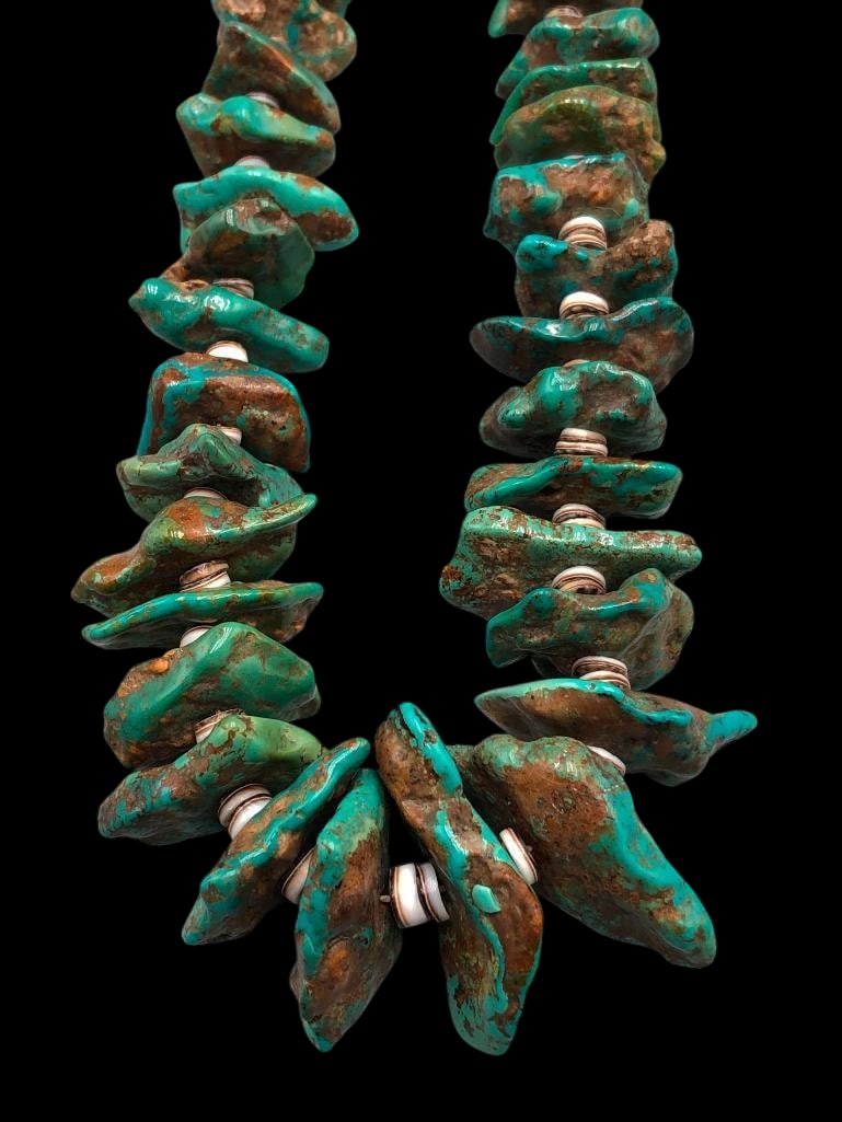 Turquoise Tab Necklace With Heishi Beads: Offered here for your consideration is a turquoise tab necklace with Heishi beads. This amazing necklace features a strand of turquoise nugget tab style beads interspersed between shell Heishi beads.