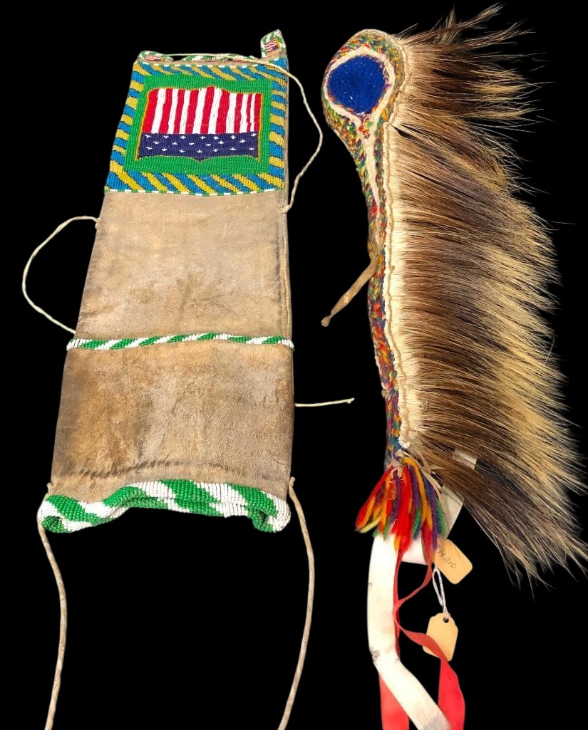 Pipe Bag And Hair Roach: Offered here for your consideration is a pipe bag and a hair roach. This is a very nice leather pipe bag with a red, white and blue seal bordered by green, white, blue and tan beaded border designs. O