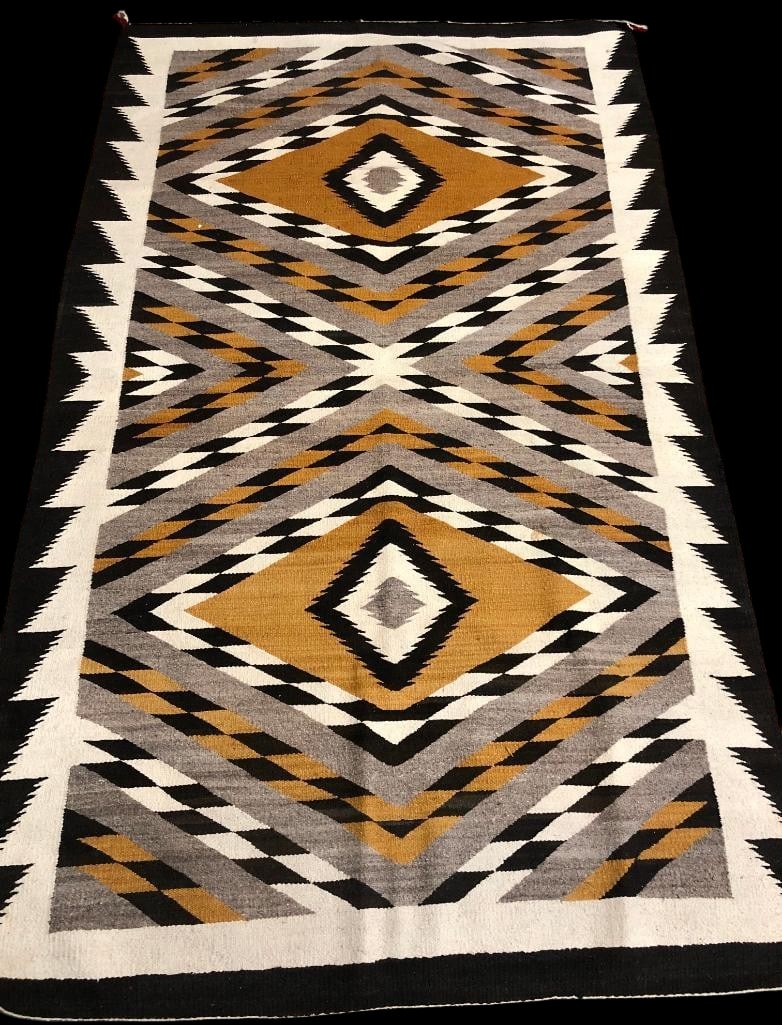 Large Vintage Navajo Floor Rug - Circa 1940s To 1950s: Available here for your consideration is a large vintage Navajo floor rug. This rug is done with graduated size diamond designs layered on each other to create a bold and outstanding design. The color