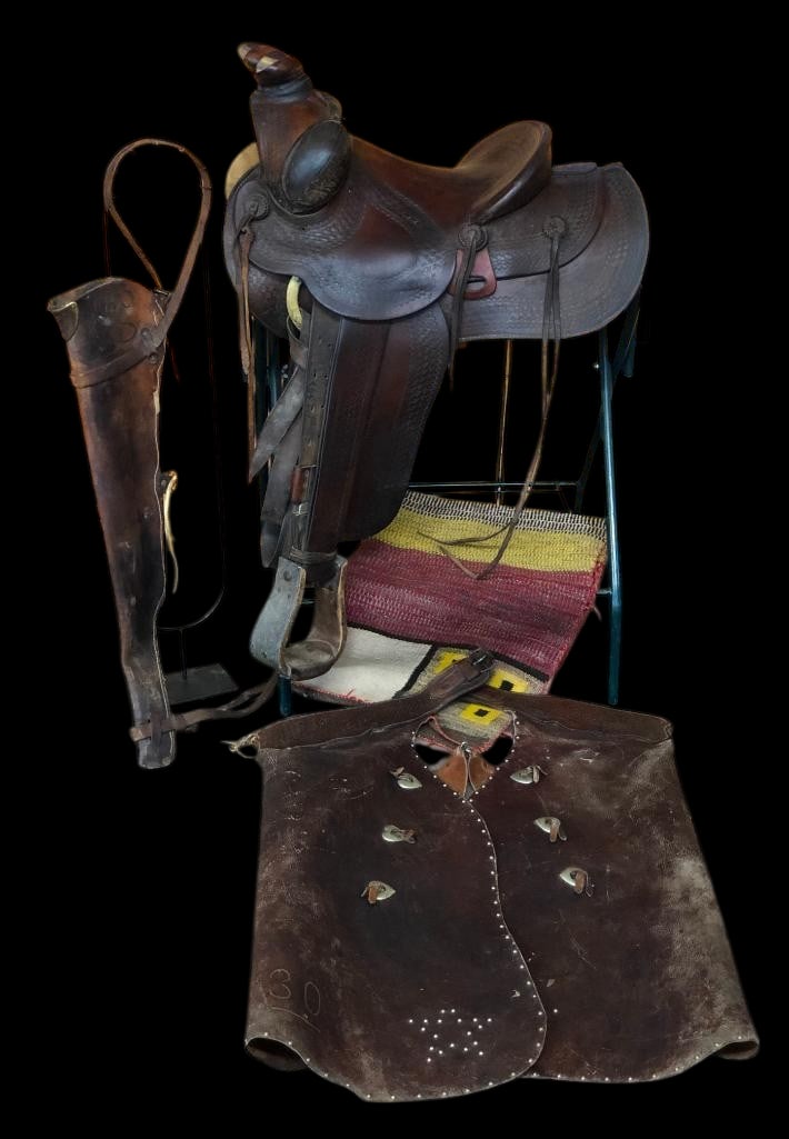 Studded Chaps, Scabbard, Saddle With Blanket From The 30 Bar Ranch: Offered here for your consideration is a pair of studded chaps, a scabbard, and a saddle with blanket, all from the 30 Bar Ranch. The cowboy who used these items "rode for the brand!" The 30 B