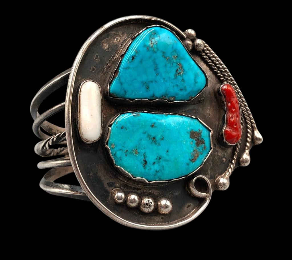 Vintage Turquoise, Coral And Mother Of Pearl Bracelet: For your bidding enjoyment we present a vintage turquoise, coral and mother of pearl bracelet. This lovely bracelet features two turquoise cabochons, one coral cabochon and one mother of pearl cabocho