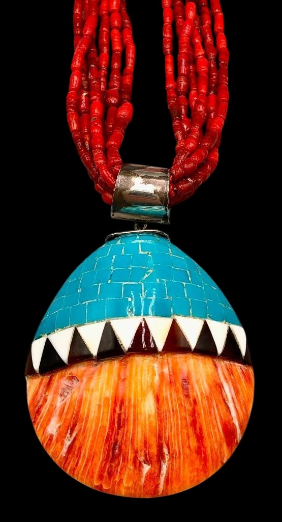 Six Strand Coral Necklace With Inlay Shell Pendant: Offered here for your consideration is a six strand coral necklace with inlay shell pendant. This necklace features six strands of coral beads strung on waxed cord finished with silver tips and findin