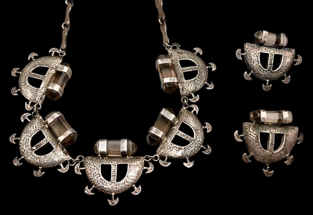 Unique Style Sterling Silver Necklace With Earrings: Offered here for your consideration is a unique style sterling silver necklace with earrings. This necklace showcases five sterling silver pendants each highlighted with a unique silver design featuri