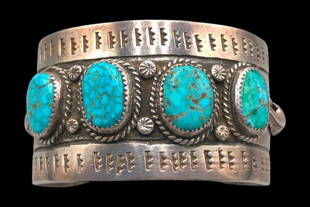 Vintage Four Stone Webbed Turquoise And Sterling Silver Bracelet: For your bidding enjoyment we present a vintage four stone webbed turquoise and sterling silver bracelet. This great bracelet showcases four turquoise cabochons resting in sawtooth silver bezels accen