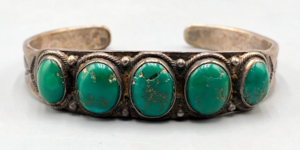 Vintage Five Stone Natural Turquoise Bracelet: For your bidding enjoyment we present a vintage five stone natural turquoise bracelet. This bracelet features five natural turquoise cabochons displayed in smooth silver bezels. The settings are set o