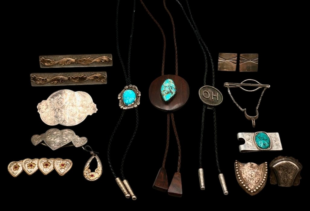 Three Western Bolo Ties And Miscellaneous Western Jewelry: Offered here for your consideration are three Western bolo ties and miscellaneous Western jewelry. This jewelry group includes three bolo ties, a money clip, cuff links, a belt tip, a single earring, 