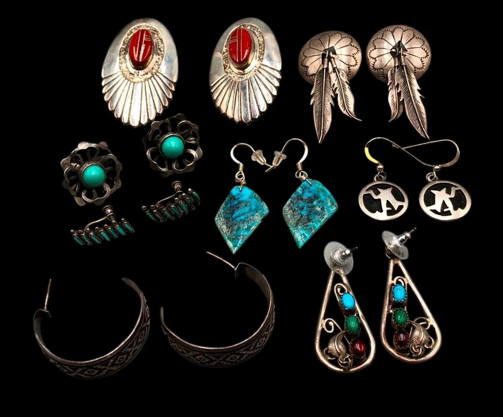 Eight Pairs Of Sterling Silver Earrings: Offered here for your consideration are eight pairs of sterling silver earrings. The variety and versatility of these earrings are great. The collection showcases a wide range of designs including tur