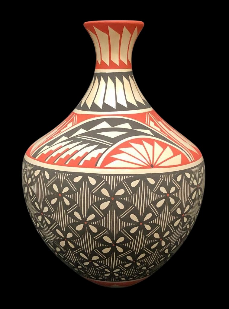 Jemez Pottery Vessel By Natalie Sandia: Offered here for your consideration is a Jemez pottery vessel by Natalie Sandia. This vessel is beautifully decorated with black and white flowers with red centers on a black striped background. The u