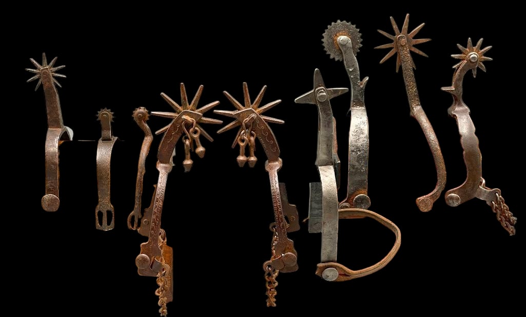 Antique Pair Buermann Spurs With Seven Singles: Available here for your consideration is an antique pair Buermann spurs with seven additional singles. The Buermann spurs have heel chains, stamped designs on the sides and shank and jingle bobs on th