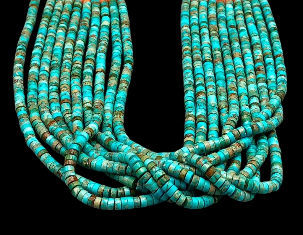 Ten Strand Turquoise And Fine Heishi Necklace: Offered here for your consideration is a ten strand turquoise and fine Heishi necklace. This necklace showcases ten strands of turquoise disc beads accented at the ends with spiny oyster and brown she